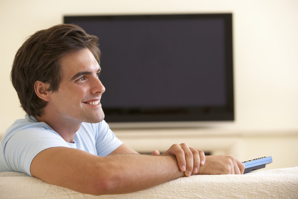 Man Watching Widescreen TV  - Foto, immagini