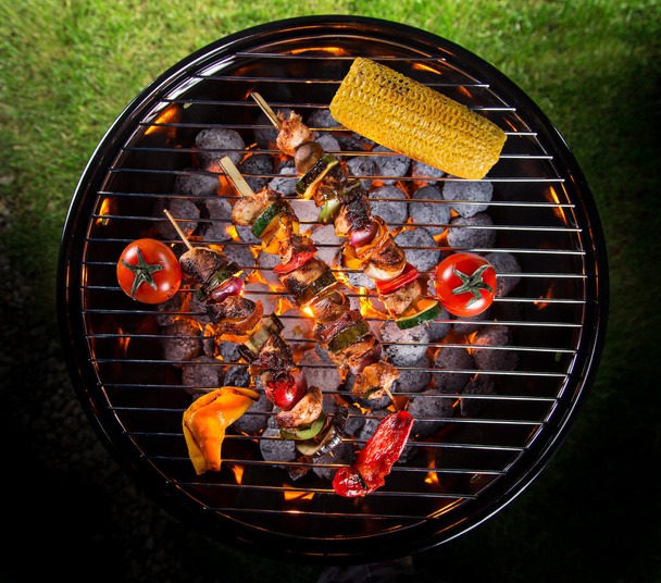 Barbecue grill with various kinds of meat. - Фото, изображение