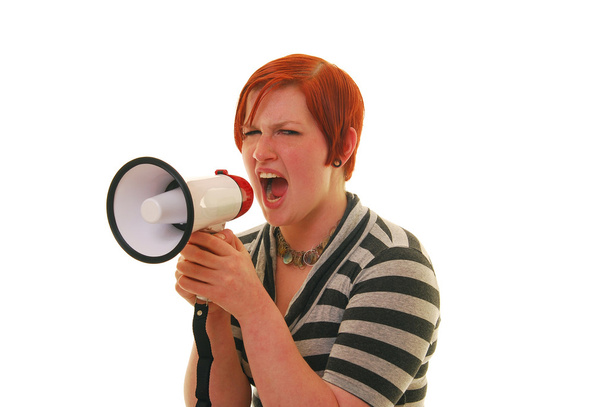 Woman yelling into a megaphone - Photo, Image
