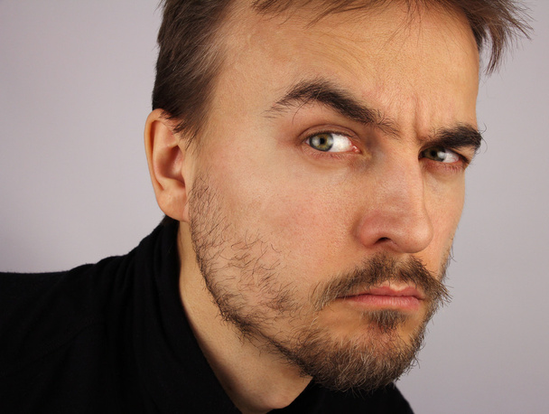 portrait of a man, suspicious look, closeup  - Photo, Image