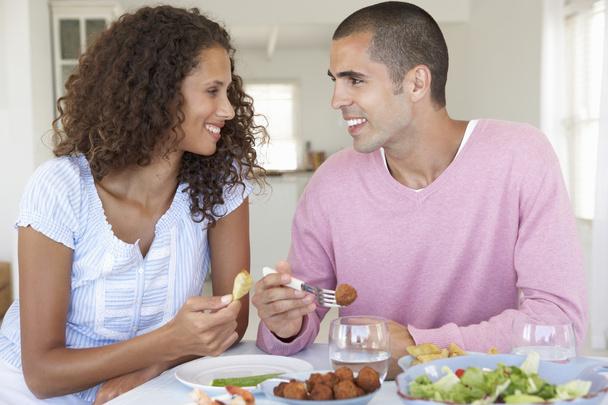 Couple Enjoying Meal At Home - Foto, immagini
