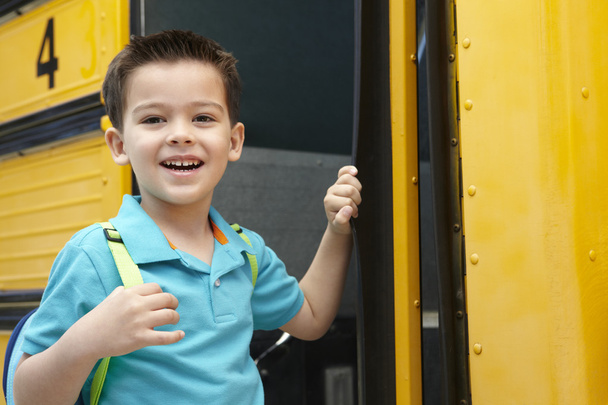 Elementary School Pupil near the Bus - Photo, Image