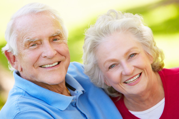 Happy Senior couple looking at camera - Photo, image
