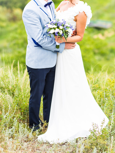 bride and groom with wedding bouquet - Photo, Image