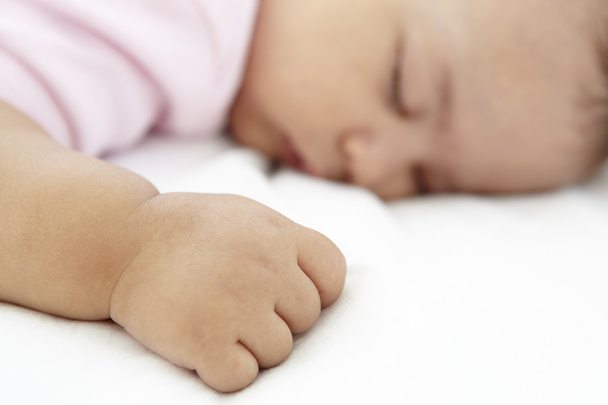 Alvó baba lány otthon - Fotó, kép