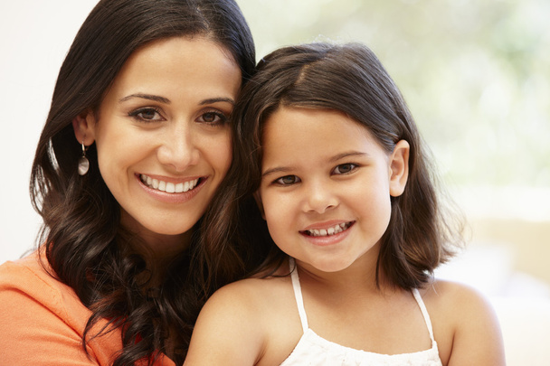 Mother and daughter smiling to camera  - Photo, Image