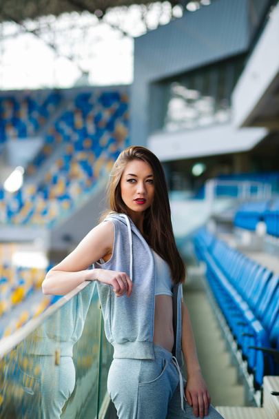 Happy young woman on stadium, sport girl , fitness lady at summe - Foto, Imagen