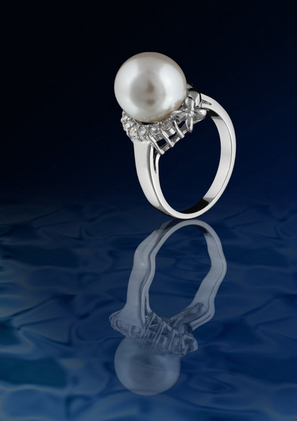 Ring with pearl on water - Photo, image