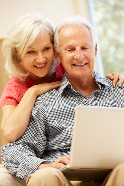 Senior man and daughter using laptop - Zdjęcie, obraz