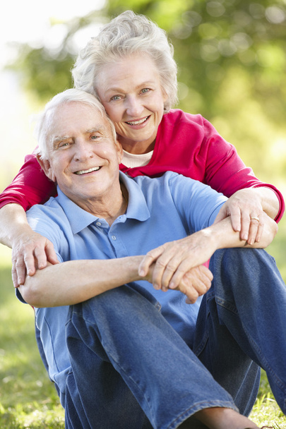 Senior couple relaxing in park - Photo, Image