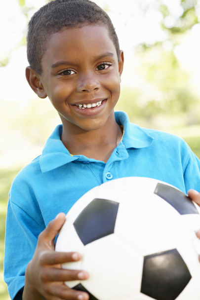 Young Boy Holding Soccer Ball  - Фото, изображение