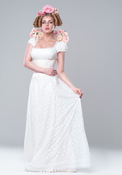 Beautiful white woman in a wedding white dress - Photo, image