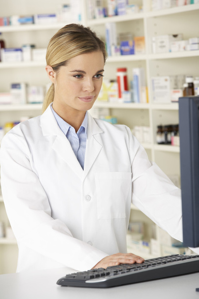 Pharmacist working on computer - Photo, image