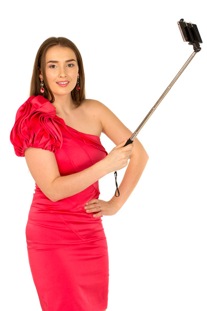 Beautiful woman in red dress with beautiful body - Foto, afbeelding