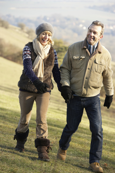 Mature couple on country walk - Valokuva, kuva