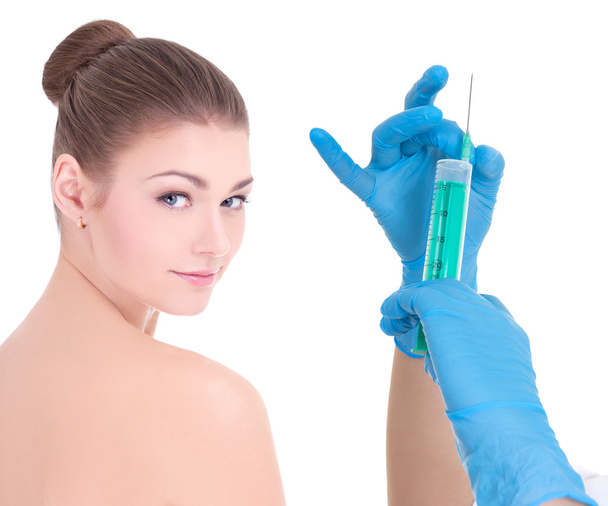 Schönheit und Botox-Injektion-Konzept - Hände mit Spritze und youn - Foto, Bild