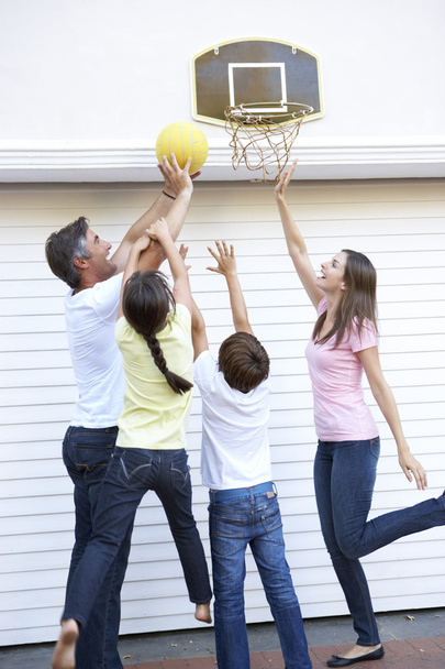 Family Playing Basketball Outside Garage  - Foto, Imagen