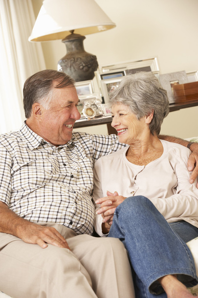 Retired Senior Couple Sitting On Sofa - Zdjęcie, obraz