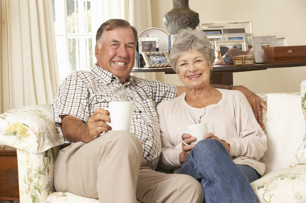 Senior Couple Drinking Tea At Home - 写真・画像