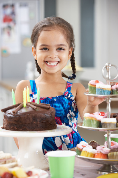 Girl Standing With Birthday Party Food - 写真・画像