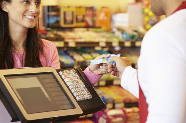 Customer Paying For Shopping  - Фото, изображение
