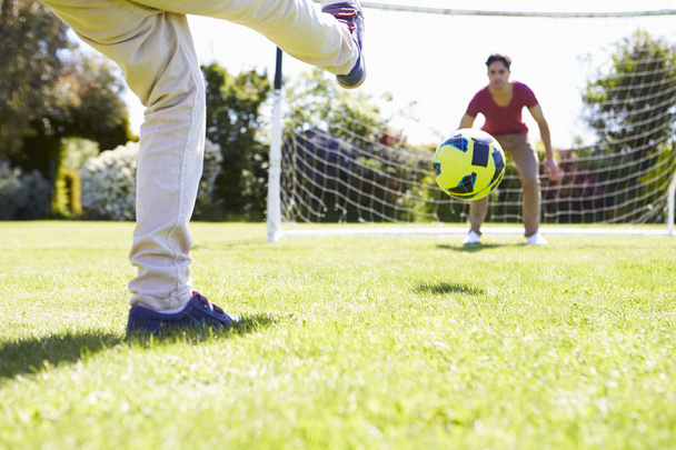 Father And Son Playing Football - Foto, imagen