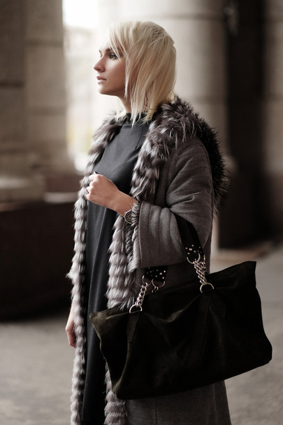 young blond woman wearing a winter look - Foto, Imagem
