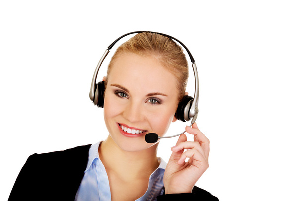 Smiling phone operator in headphones - Foto, imagen