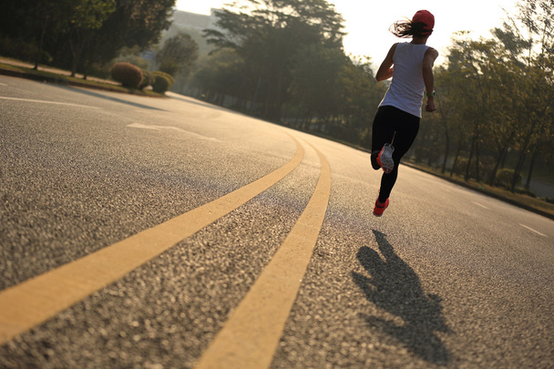 young woman running  at road - Photo, Image