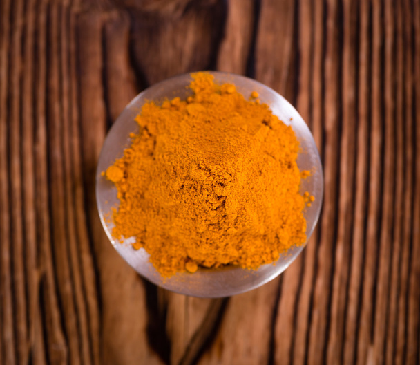 turmeric on an old wooden table - Photo, Image