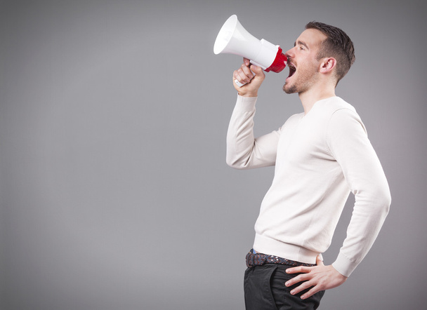 Man screaming with a megaphone - Foto, imagen