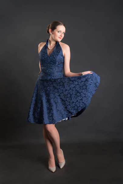 girl in a blue dress - Fotó, kép