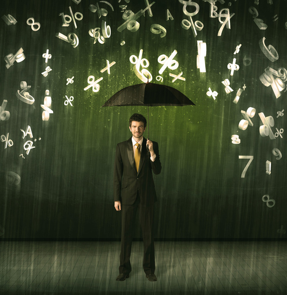Businessman standing with umbrella and 3d numbers raining concep - Fotoğraf, Görsel