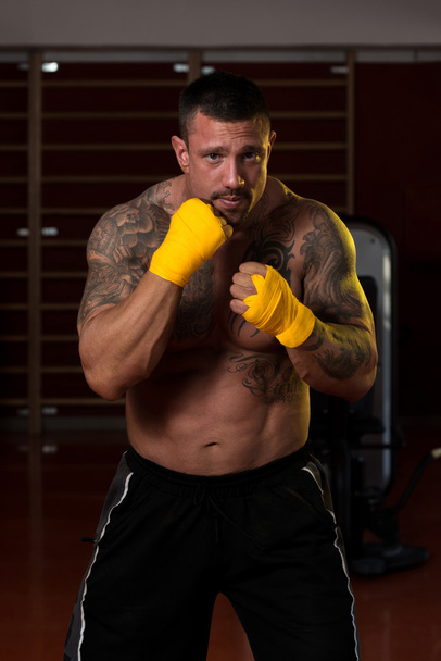 Muscular Boxer MMA Fighter Practice His Skills - Photo, image