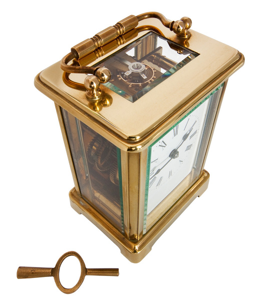 Антикварний годинник перевезення з римськими цифрами і ключ - Фото, зображення