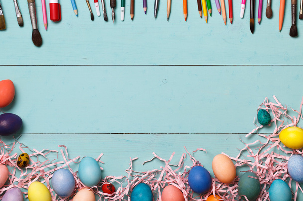 Easter eggs with painting tools - 写真・画像