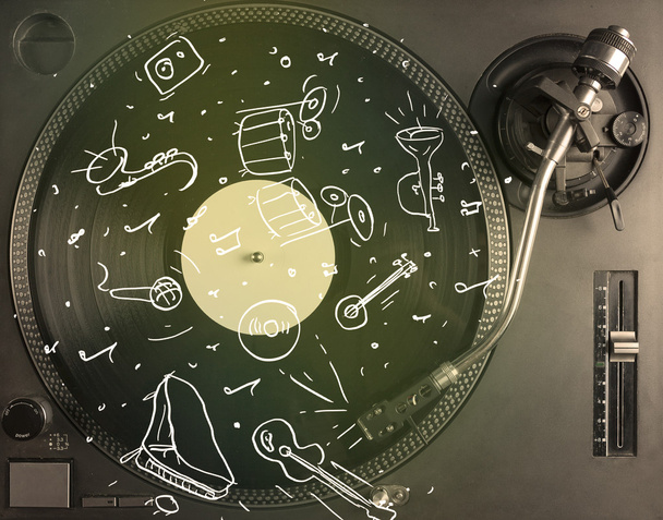 Turntable playing classical music with icon drawn instruments  - Foto, Bild
