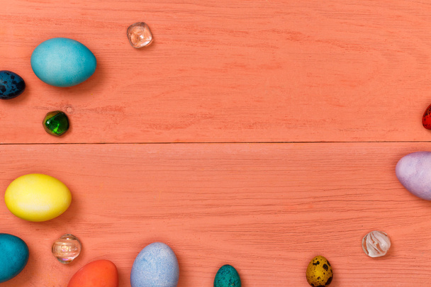 Easter eggs on wooden workplace - Фото, зображення