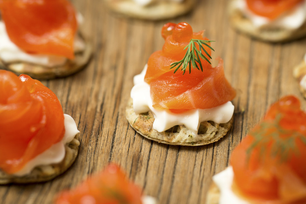 Smoked Trout amuse bouche on a wooden table - Photo, Image