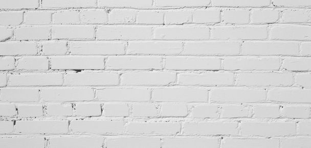 Brick wall painted with white paint. - Fotografie, Obrázek