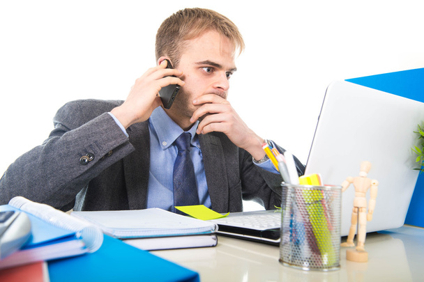 young businessman worried tired talking on mobile phone in office suffering stress - Foto, Imagen