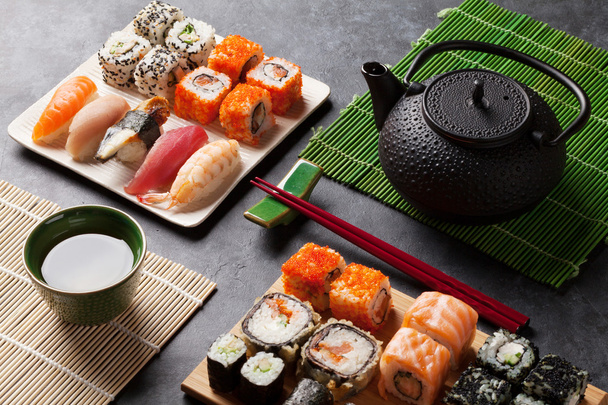 Set of sushi and maki rolls and green tea - Photo, Image