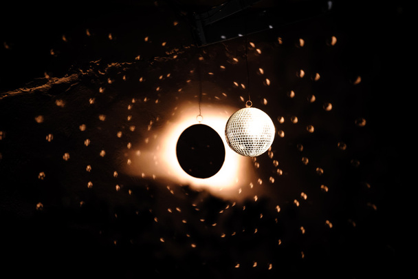 Spotlight on disco ball - Photo, Image