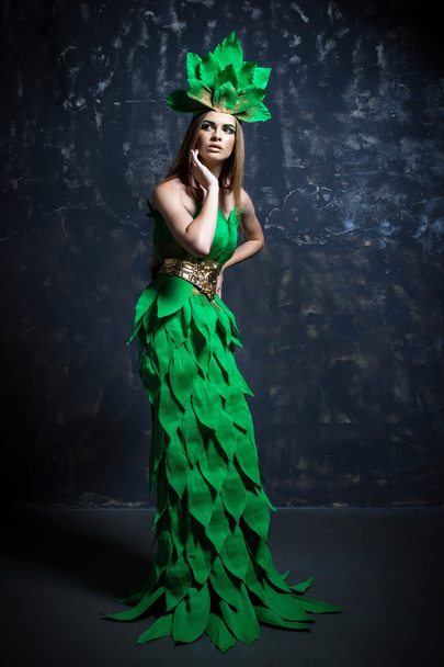 Beautiful  girl model  posing, long green dress, fashion photo studio - Photo, image
