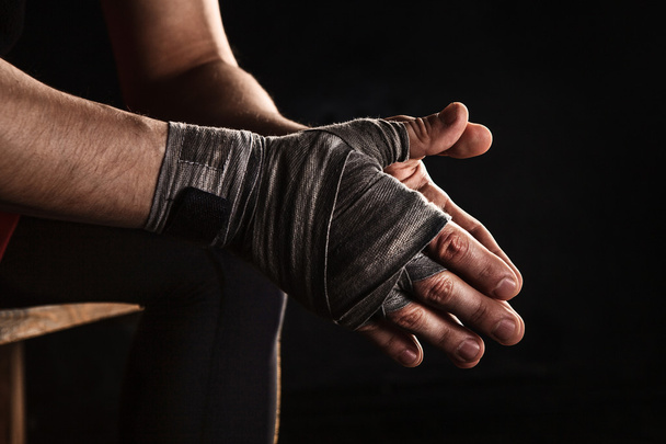 Close-up hand of muscular man with bandage - Foto, Imagen
