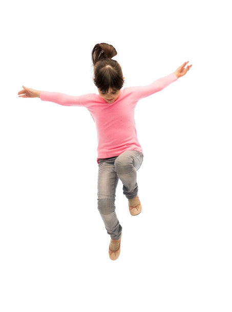 happy little girl jumping in air - Foto, Imagem