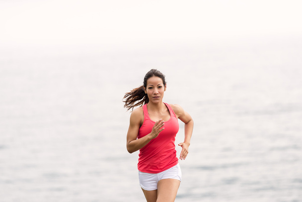 Fit woman running - Valokuva, kuva
