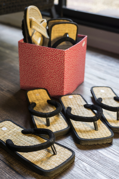 Onsen series: Weave sandals on wooden floor - Photo, Image