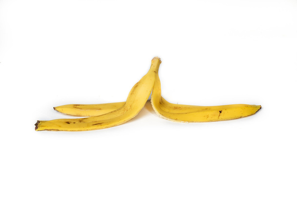 banana peel on white background - Foto, afbeelding