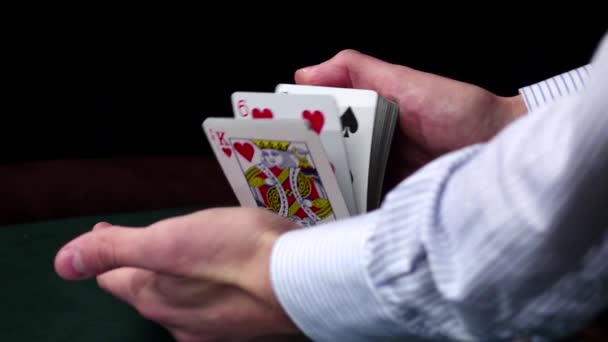 Croupie shuffling the standart poker cards, slow motion - Video, Çekim